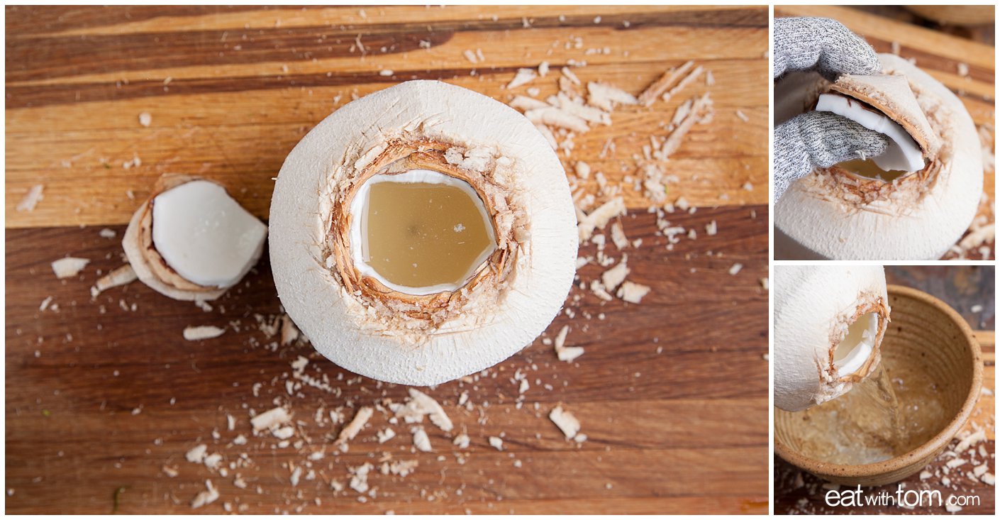 breaking open a coconut with chefs knife at home for coconut water and flesh