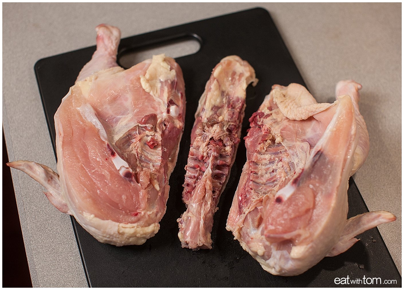 How to cut a raw whole chicken in half with a Wusthof Chefs Knife.
