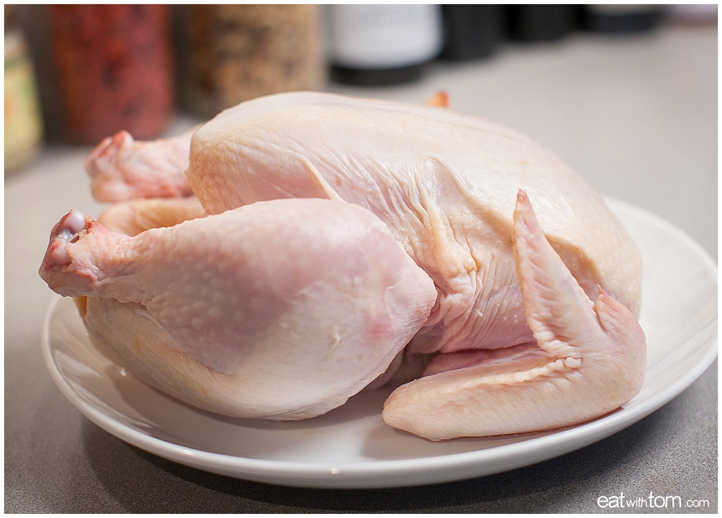 Prepare the raw chicken by wiping it dry
