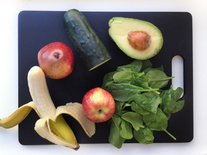 Ingredients for green smoothie recipe, fruit and greens, spinach and cucumber
